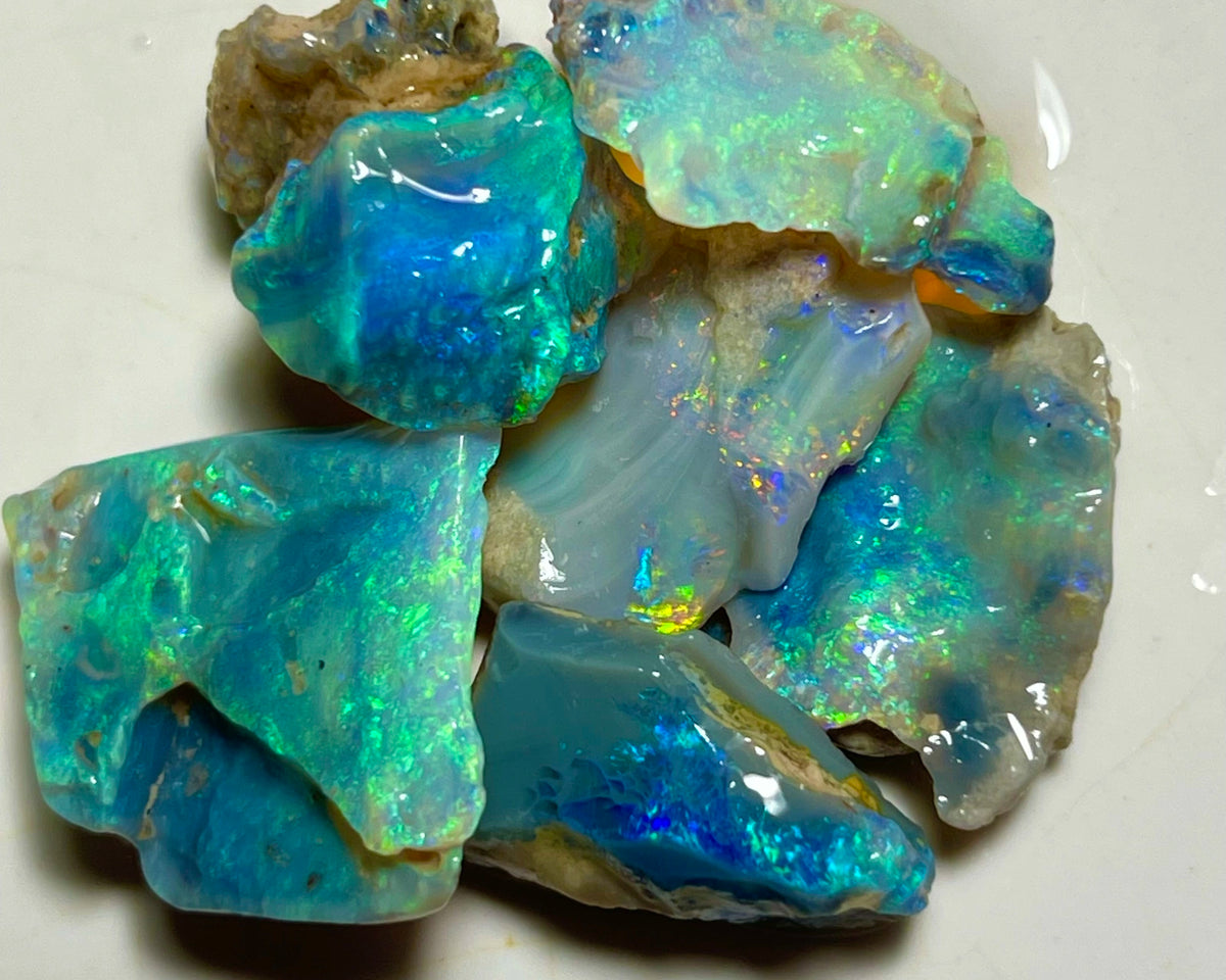 Lightning Ridge Cutters Dark Crystal Seam opal parcel 44.75cts Loaded with Bright Multicolours packed with Potential 20x20x4mm to 20x12x6mm Auctions Details to come Lot B4-A873