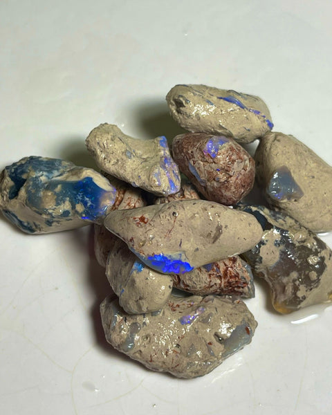 Lightning Ridge 299.00cts 30x17x13 to 18x12x9 mm Bid-4.com Bid for Australian opal raw/rough/rubbed/polished £1 No Reserve Auctions Details to come Lot B4-A869