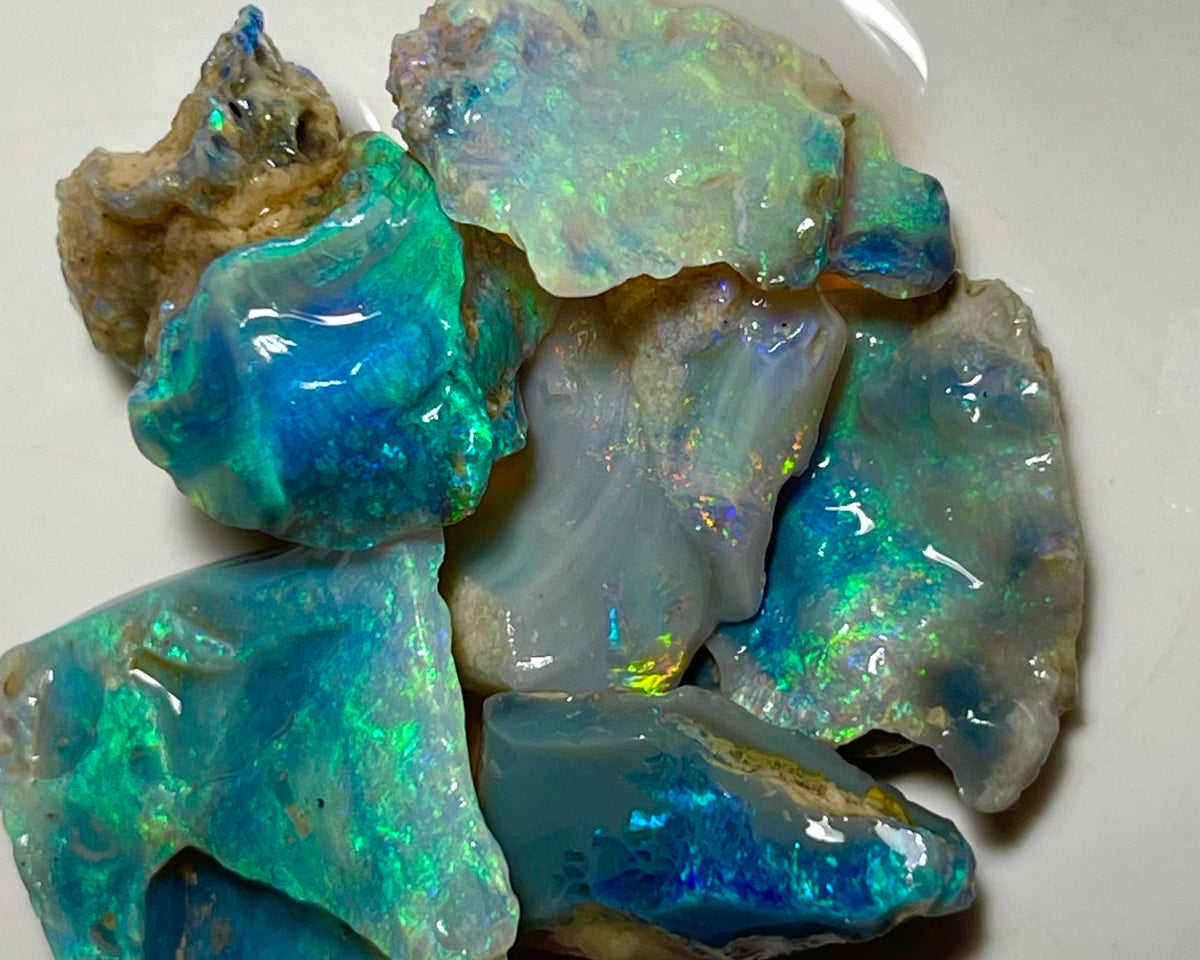 Lightning Ridge Cutters Dark Crystal Seam opal parcel 44.75cts Loaded with Bright Multicolours packed with Potential 20x20x4mm to 20x12x6mm Auctions Details to come Lot B4-A873