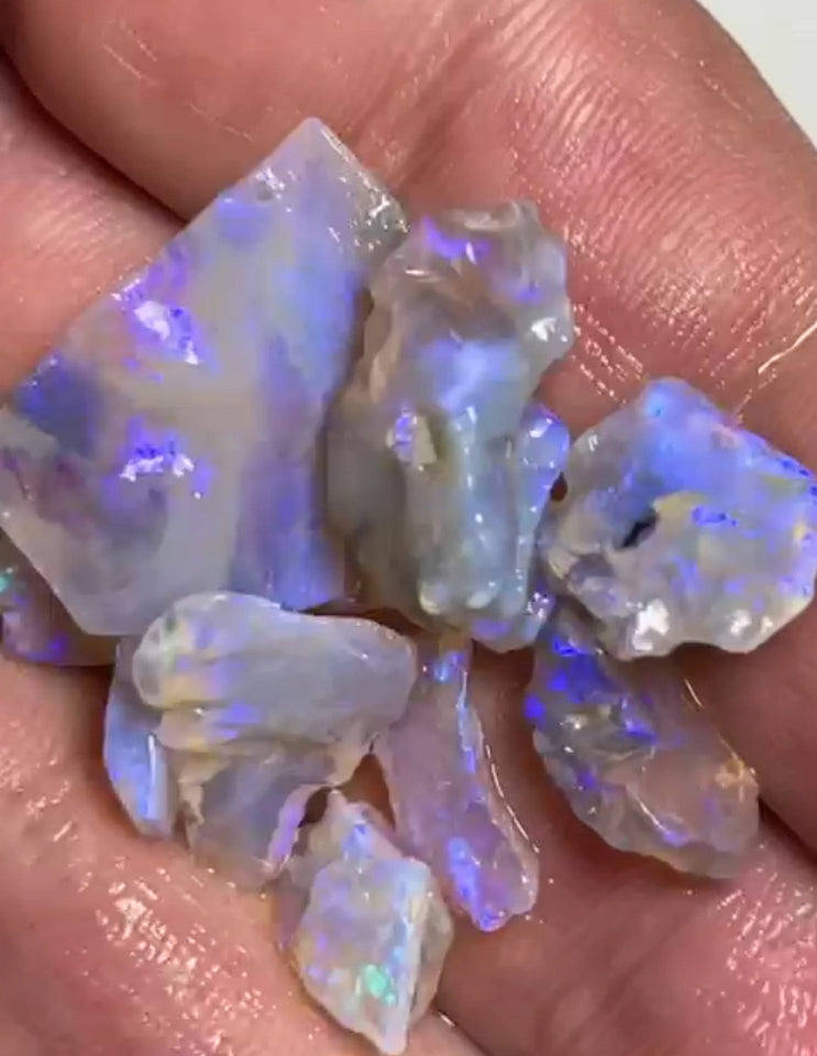Lightning Ridge Dark Base Crystal opal rough parcel 29.00cts Mostly Blue colours to chase here  20x12x1 to 6x4x1 mm Lot B4-A818