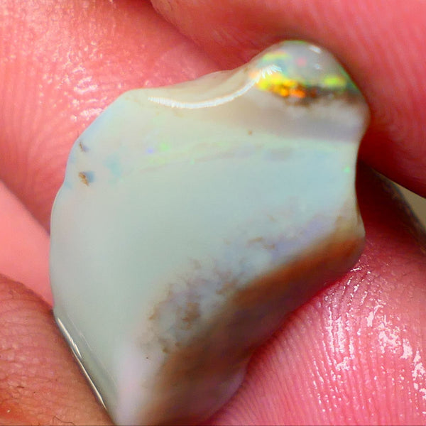 Lightning Ridge opal with interesting bit of bar 11.00cts Multicolours on Black base 24x15x5mm B4-A167