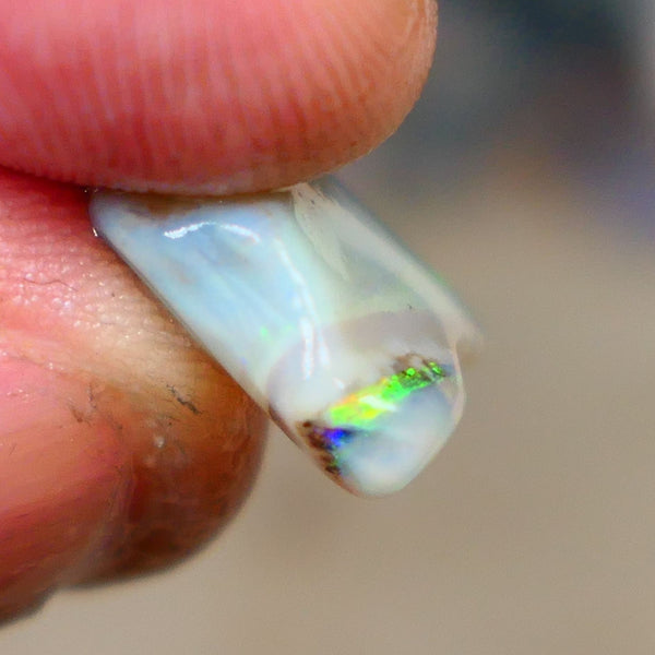 Lightning Ridge opal with interesting bit of bar 11.00cts Multicolours on Black base 24x15x5mm B4-A167