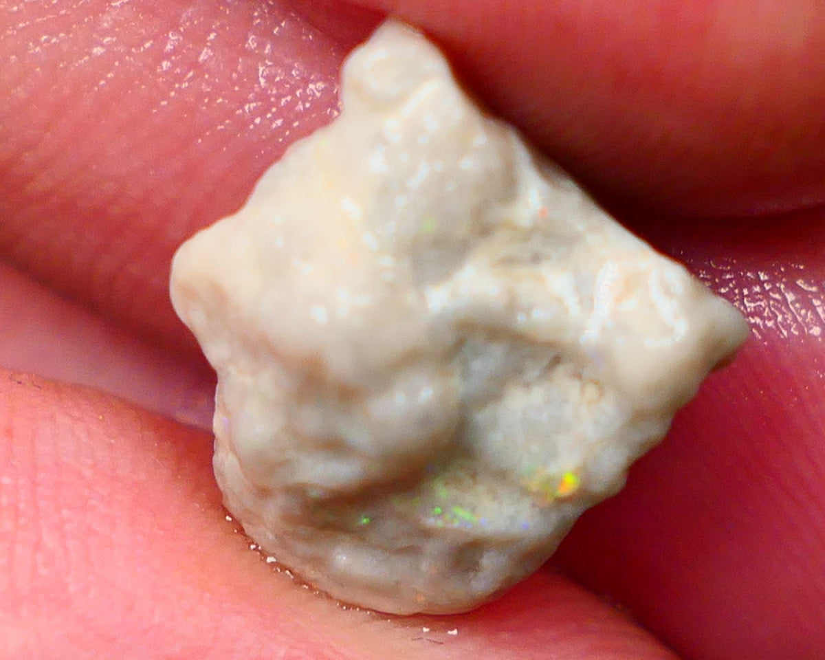 Oranges on this Knobby opal rough of Lightning Ridge 6.90cts Sold as gamble 16x12x9mm   Lot B4-A147