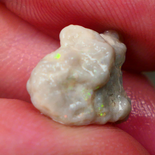 Oranges on this Knobby opal rough of Lightning Ridge 6.90cts Sold as gamble 16x12x9mm   Lot B4-A147