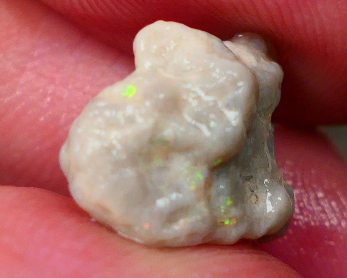 Oranges on this Knobby opal rough of Lightning Ridge 6.90cts Sold as gamble 16x12x9mm   Lot B4-A147