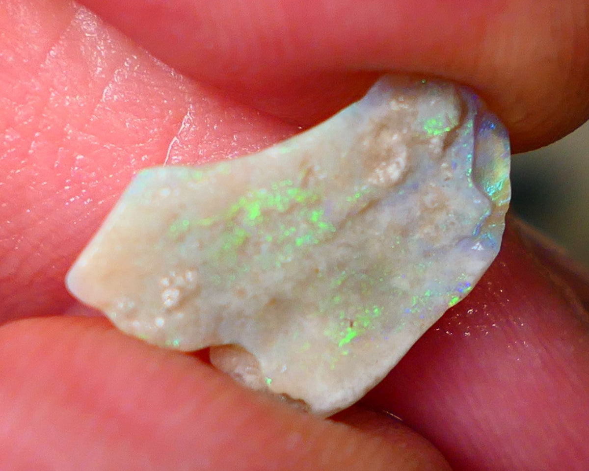 Lightning Ridge Dark Base Seam opal 1.75cts Stunning Multicolours to cut 15x11x2mm  Lot B4-A141