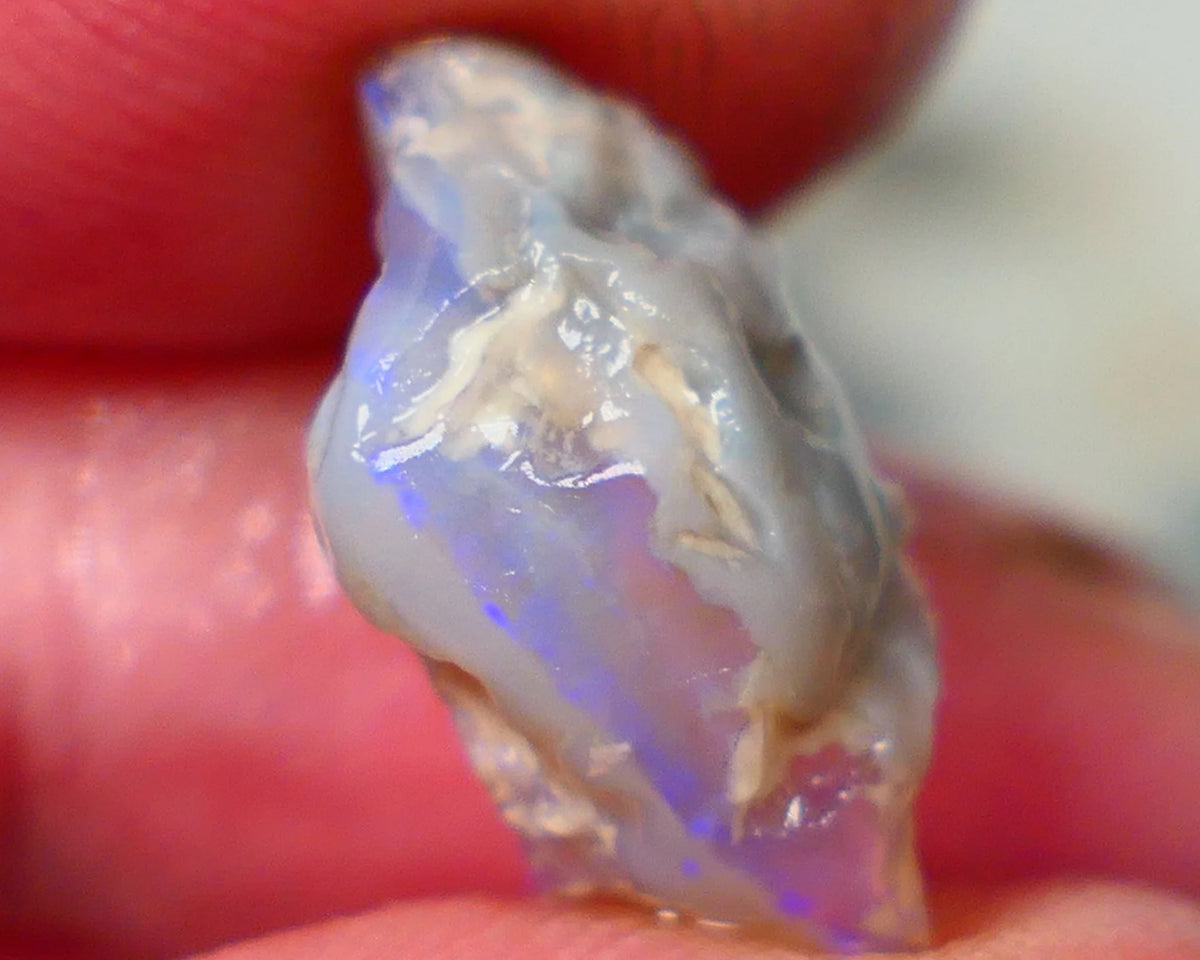 Lightning Ridge Crystal on Dark base half a knobby split opal rough 5.30cts Flat bar with Blue fires to expose 18x8x8mm Lot  B4-A196