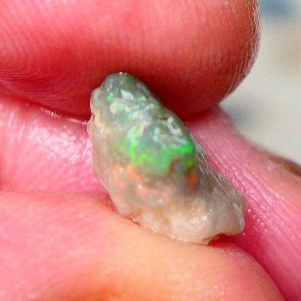 Lightning Ridge Exotic Pea knobby rough 2.70cts Dark base with Yellow/ Green dominant Multifires 13x7x6mm Lot B4-A199