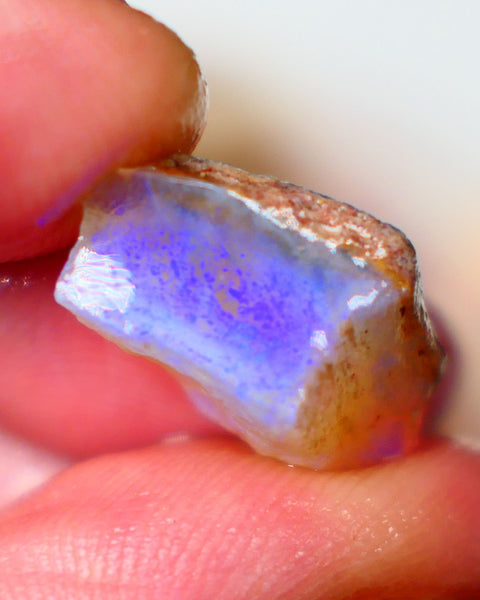 Thick bar on this Coober Pedy Seam opal rough 9.00cts Nice Blues showing to cut 20x11x9mm Lot B4-A062