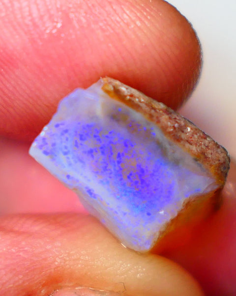 Thick bar on this Coober Pedy Seam opal rough 9.00cts Nice Blues showing to cut 20x11x9mm Lot B4-A062