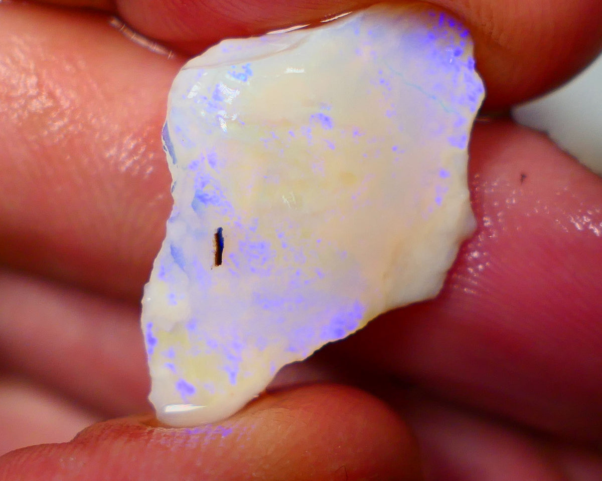 Bright Blues on this light/white base seam opal rough 6.75cts From Coober Pedy 26x17x4mm  Lot B4-A061