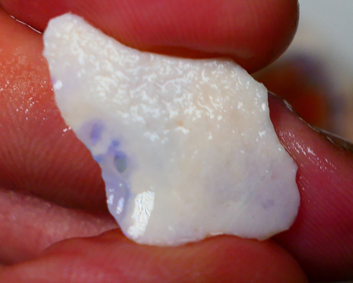 Bright Blues on this light/white base seam opal rough 6.75cts From Coober Pedy 26x17x4mm  Lot B4-A061