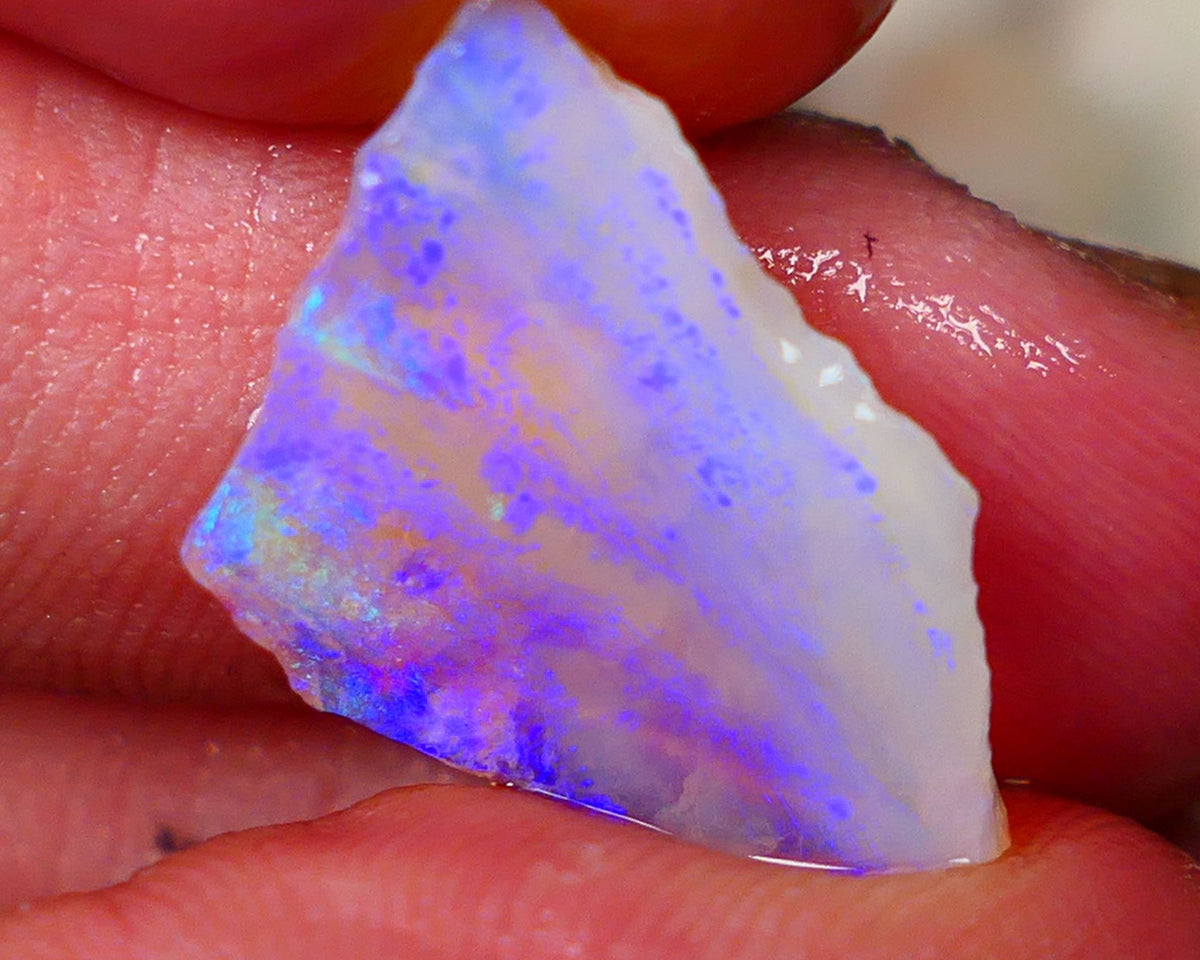 Coober Pedy Seam opal rough 7.50cts lots of exposed Blue fires to go at 22x14x5mm  Lot B4-A053