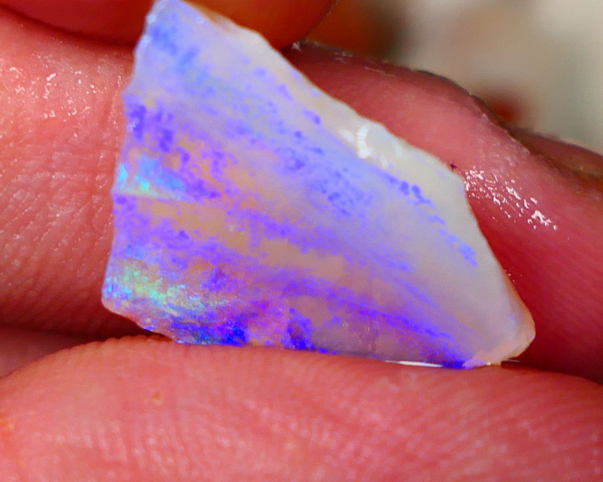 Coober Pedy Seam opal rough 7.50cts lots of exposed Blue fires to go at 22x14x5mm  Lot B4-A053