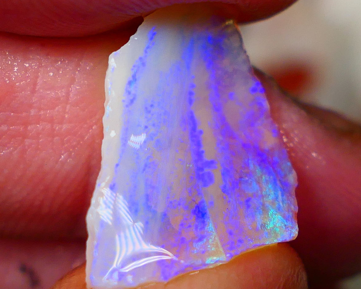 Coober Pedy Seam opal rough 7.50cts lots of exposed Blue fires to go at 22x14x5mm  Lot B4-A053