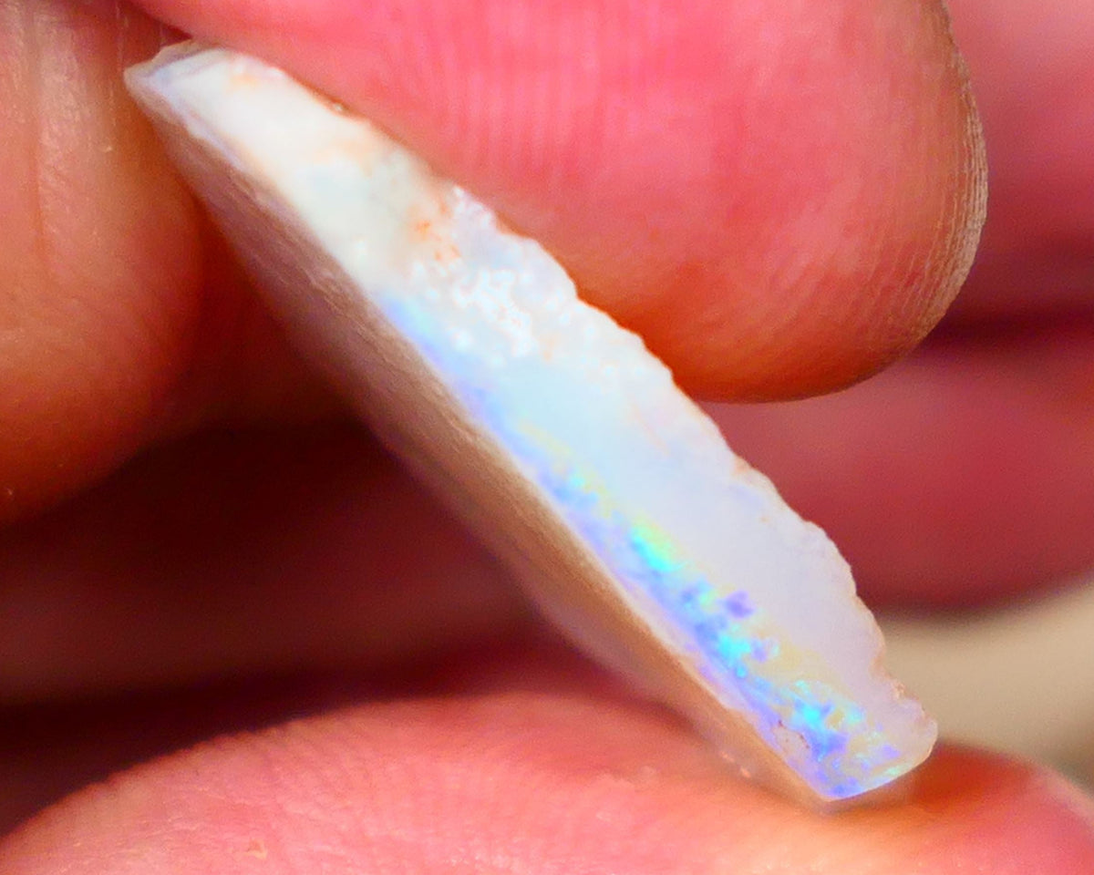 Coober Pedy Light  base seam opal rough 13.00cts Flat bar with Light blue and Green fires  to gamble 30x17x4mm  Lot B4-A050