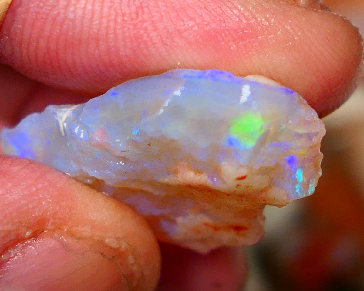 Big sized Coober Pedy Crystal Seam opal rough 24.00cts Thick bar with blue/green/yellow fires 29x17x8mm Lot B4-A049