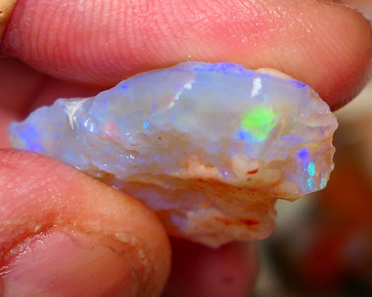 Big sized Coober Pedy Crystal Seam opal rough 24.00cts Thick bar with blue/green/yellow fires 29x17x8mm Lot B4-A049