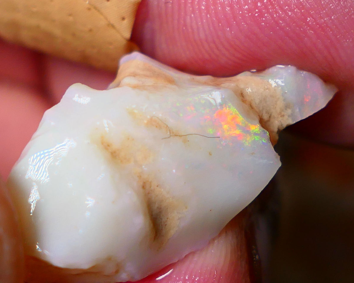 Coober Pedy Seam opal rough 18.00cts with zone of Bright Multicolours 28x14x10mm Lot B4-A063