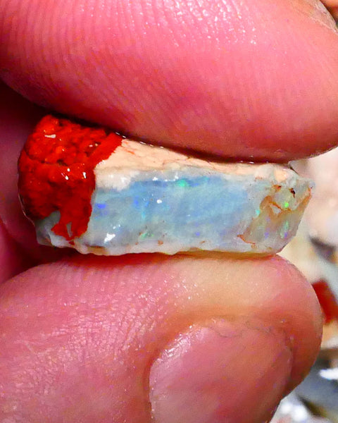 Some Flashes of Greens & Blue fires 11.75cts Coober Pedy Dark base seam opal rough gamble 21x13x9mm Lot B4-A417