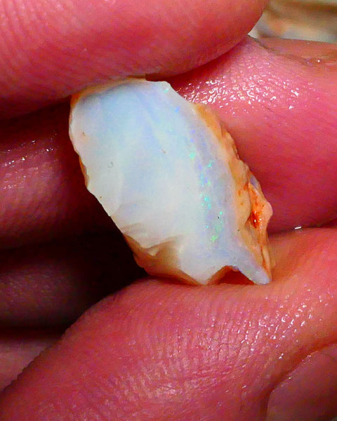 Coober Pedy Seam opal 8.00cts Thin bar with light tones of greens & blues to gamble 22x10x8mm Lot B4-A423