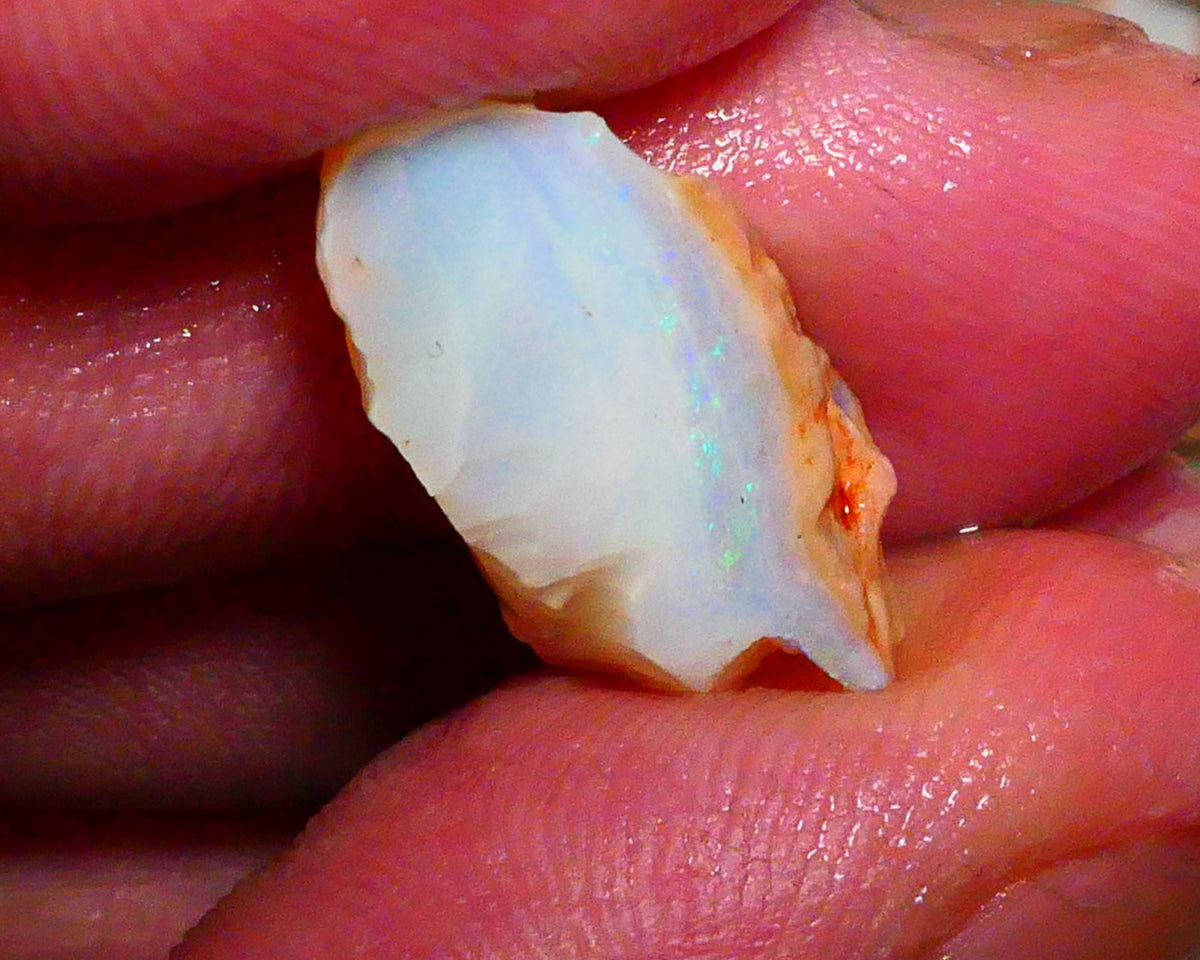 Coober Pedy Seam opal 8.00cts Thin bar with light tones of greens & blues to gamble 22x10x8mm Lot B4-A423