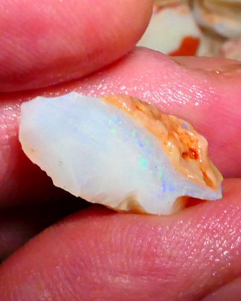 Coober Pedy Seam opal 8.00cts Thin bar with light tones of greens & blues to gamble 22x10x8mm Lot B4-A423