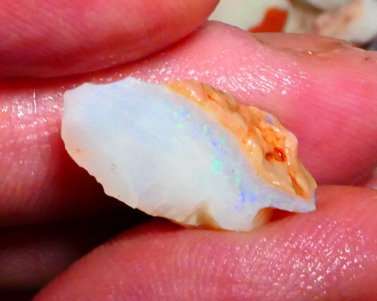 Coober Pedy Seam opal 8.00cts Thin bar with light tones of greens & blues to gamble 22x10x8mm Lot B4-A423