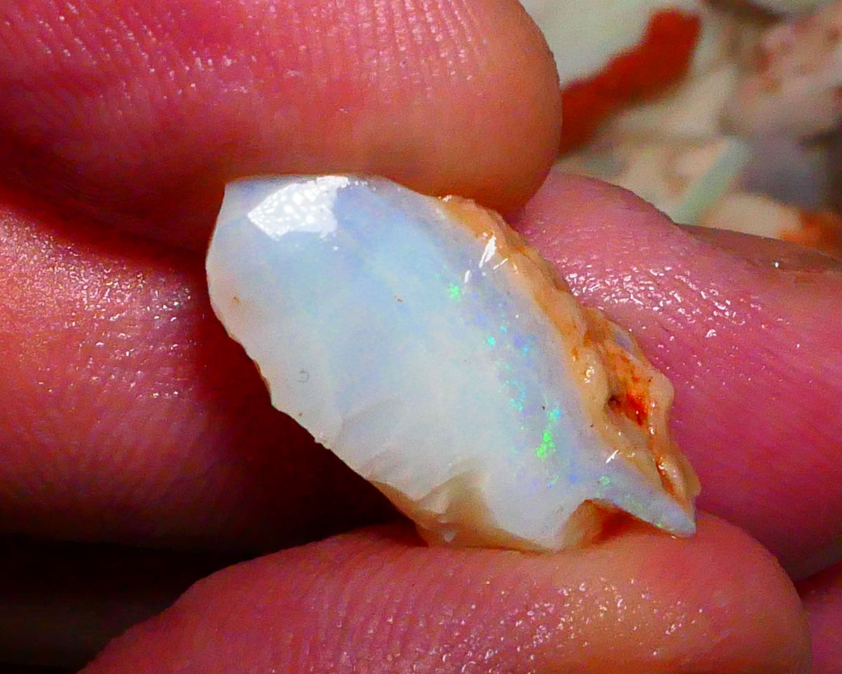 Coober Pedy Seam opal 8.00cts Thin bar with light tones of greens & blues to gamble 22x10x8mm Lot B4-A423