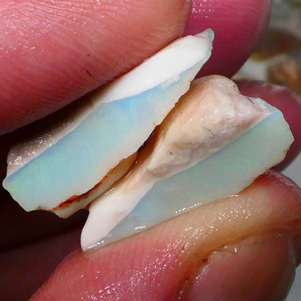 Thick bars carrying lots of Green fires 25.00cts rough to cut, photos do not do justice 23x16x10mm & 22x21x9mm Lot B4-A792