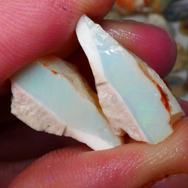 Thick bars carrying lots of Green fires 25.00cts rough to cut, photos do not do justice 23x16x10mm & 22x21x9mm Lot B4-A792