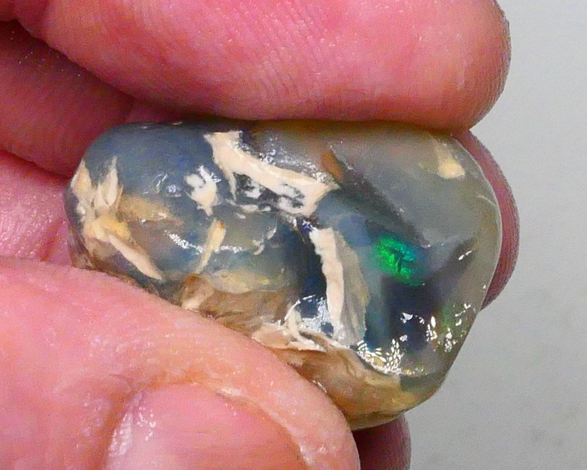 Big Sized Dark base Lightning Ridge Knobby opal rough 58.00cts Green Fires flashes in the exposed bar to chase 28x25x17mm  Lot B4-A438