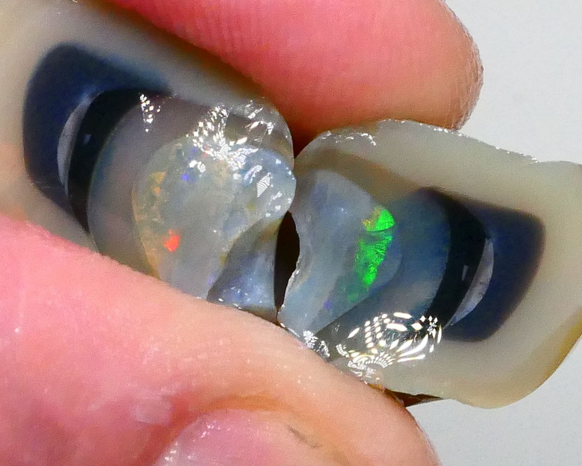 Green dominant Multifires exposed in the bars of this 41.50cts Dark Crystal knobby opal split of Lightning Ridge 22x14x13mm & 18x15x14mm  Lot B4-A458