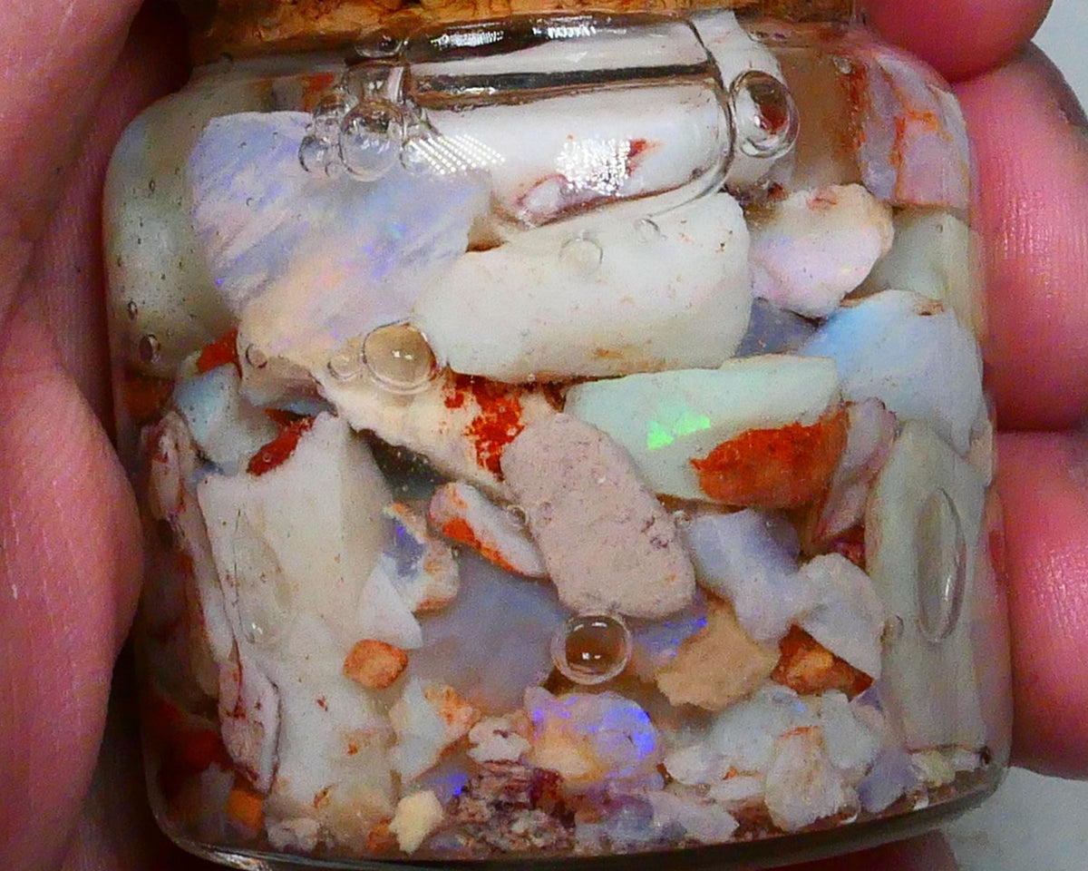 Coober Pedy Potch and bits of colours only 275.00cts Lower Grade but some colours to hunt out 17mm to chip Lot B4-A460
