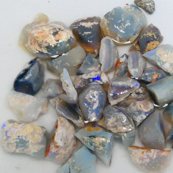 Parcel of Mixed based knobby opal split left over from a  Matey splitting mission lol 300.00cts Some colours for fun sold as gamble 17mm to chip size  Lot B4-A471