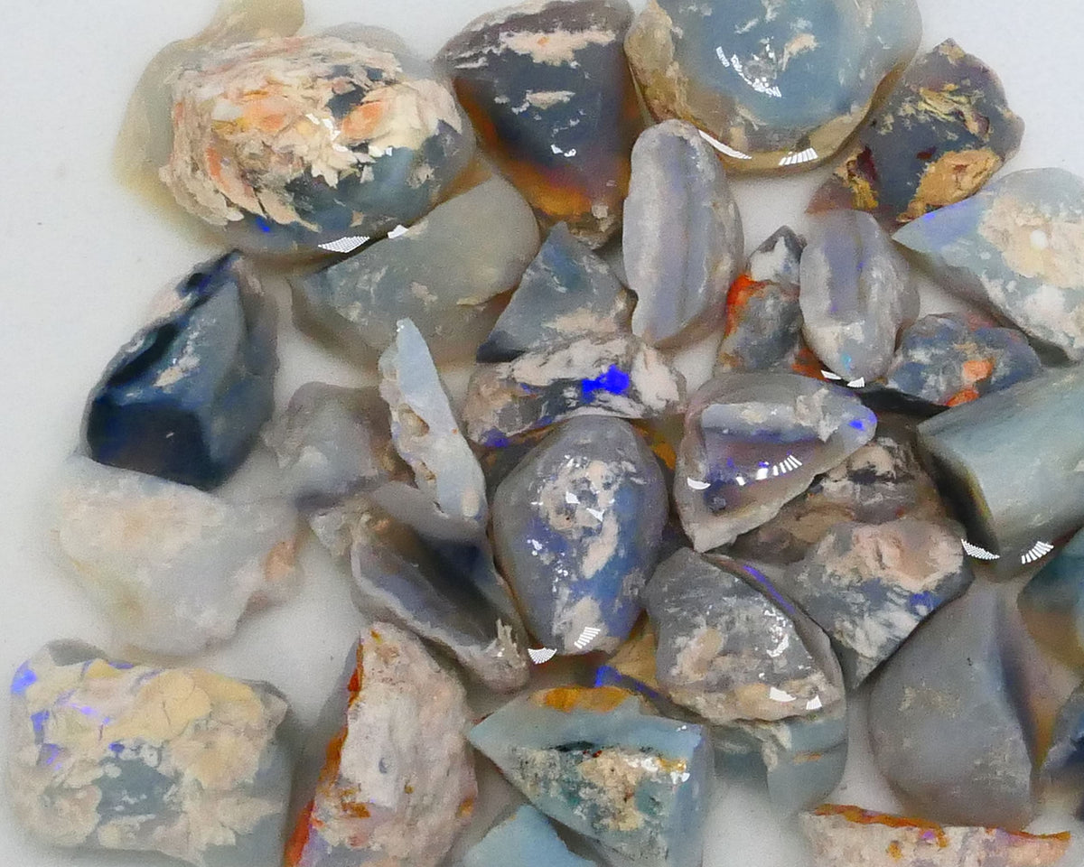 Parcel of Mixed based knobby opal split left over from a  Matey splitting mission lol 300.00cts Some colours for fun sold as gamble 17mm to chip size  Lot B4-A471