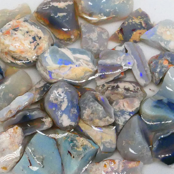 Parcel of Mixed based knobby opal split left over from a  Matey splitting mission lol 300.00cts Some colours for fun sold as gamble 17mm to chip size  Lot B4-A471