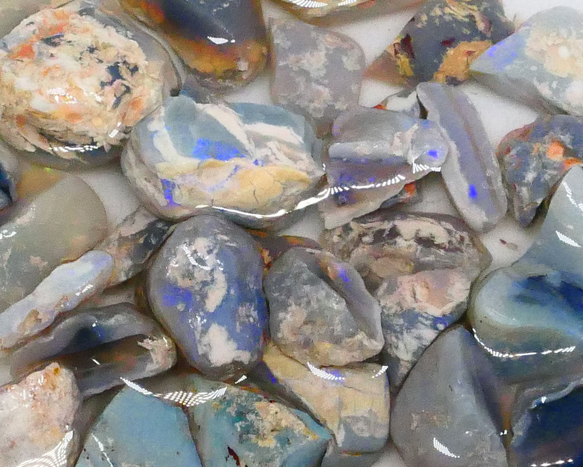 Parcel of Mixed based knobby opal split left over from a  Matey splitting mission lol 300.00cts Some colours for fun sold as gamble 17mm to chip size  Lot B4-A471