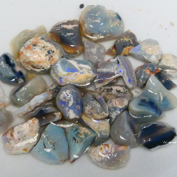 Parcel of Mixed based knobby opal split left over from a  Matey splitting mission lol 300.00cts Some colours for fun sold as gamble 17mm to chip size  Lot B4-A471