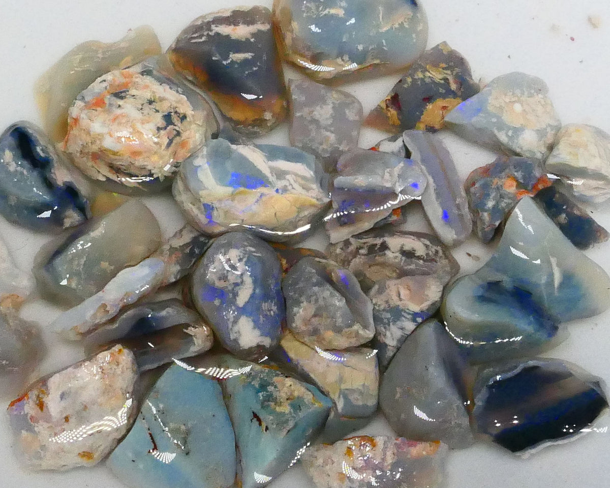 Parcel of Mixed based knobby opal split left over from a  Matey splitting mission lol 300.00cts Some colours for fun sold as gamble 17mm to chip size  Lot B4-A471