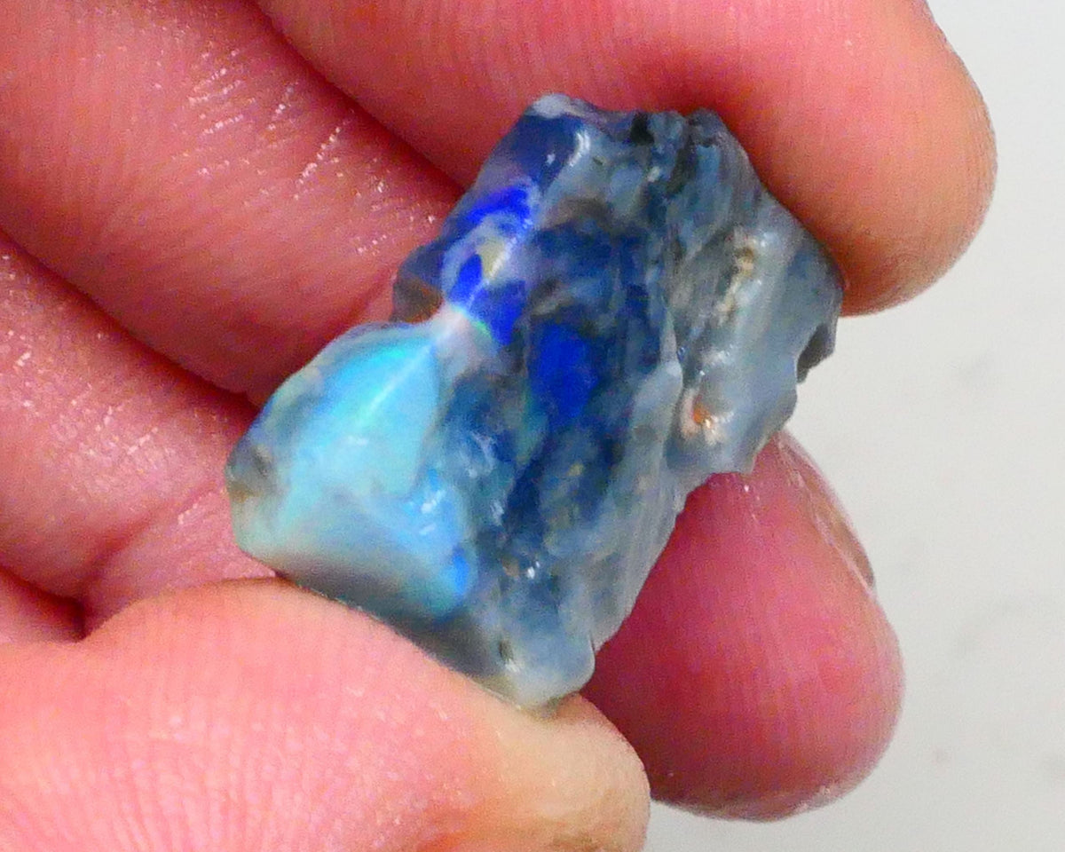 Gorgeous Blues on Dark base seam opal rough pair 22.00cts Lots colour showing to chase & potentially cut here 25x16x9mm & 22x16x5mm  Lot B4-A481