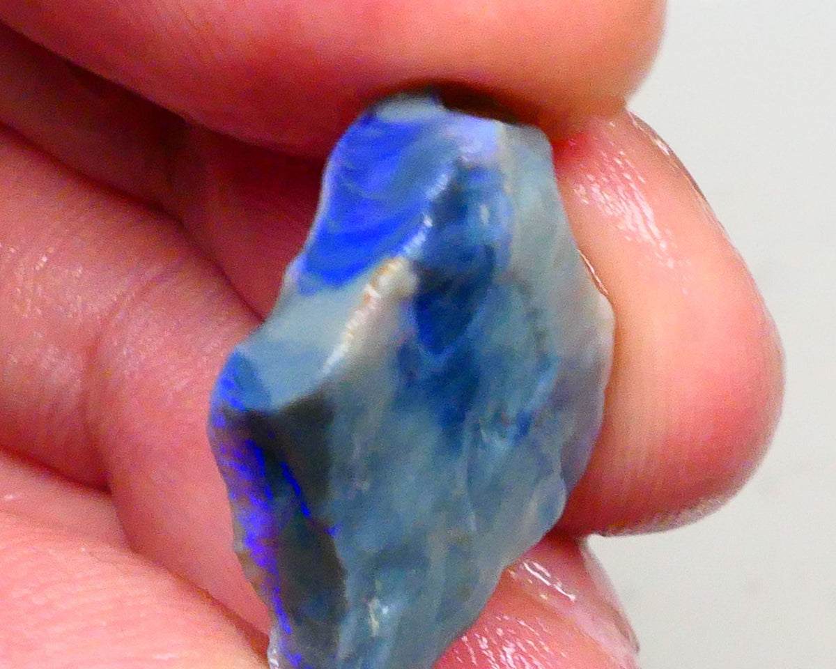 Gorgeous Blues on Dark base seam opal rough pair 22.00cts Lots colour showing to chase & potentially cut here 25x16x9mm & 22x16x5mm  Lot B4-A481
