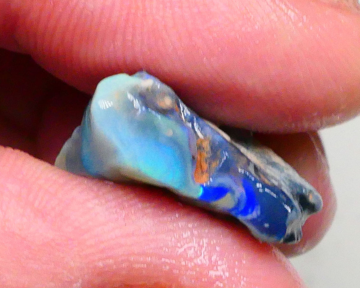 Gorgeous Blues on Dark base seam opal rough pair 22.00cts Lots colour showing to chase & potentially cut here 25x16x9mm & 22x16x5mm  Lot B4-A481