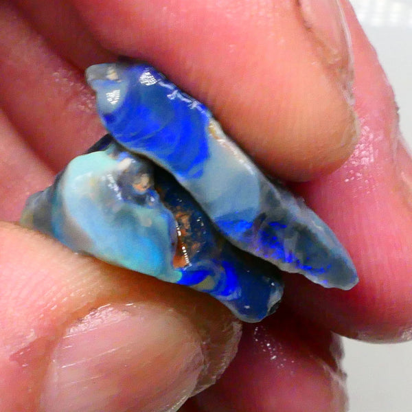Gorgeous Blues on Dark base seam opal rough pair 22.00cts Lots colour showing to chase & potentially cut here 25x16x9mm & 22x16x5mm  Lot B4-A481