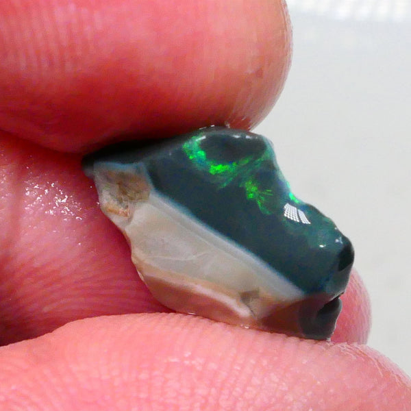 Black seam opal rough of Lightning Ridge 5.50cts Green dominant fires to chase, explore & cut 17x11x6mm  Lot B4-A479