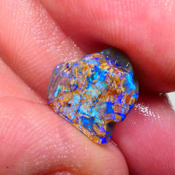 Piece of opalised Wood Fossil from Lighting Ridge 5.00cts Very Bright Electric tones & hues of greens & Blues in a Flat bar Maybe a cutter inclusions to work around 14x14x5mm  Lot B4-A497