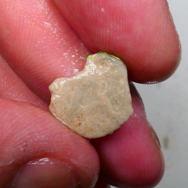 Oranges & Yellows dominant here 4.00cts Small Point to be had for those who dare Lightning Ridge 15x13x6mm Lot B4-A493