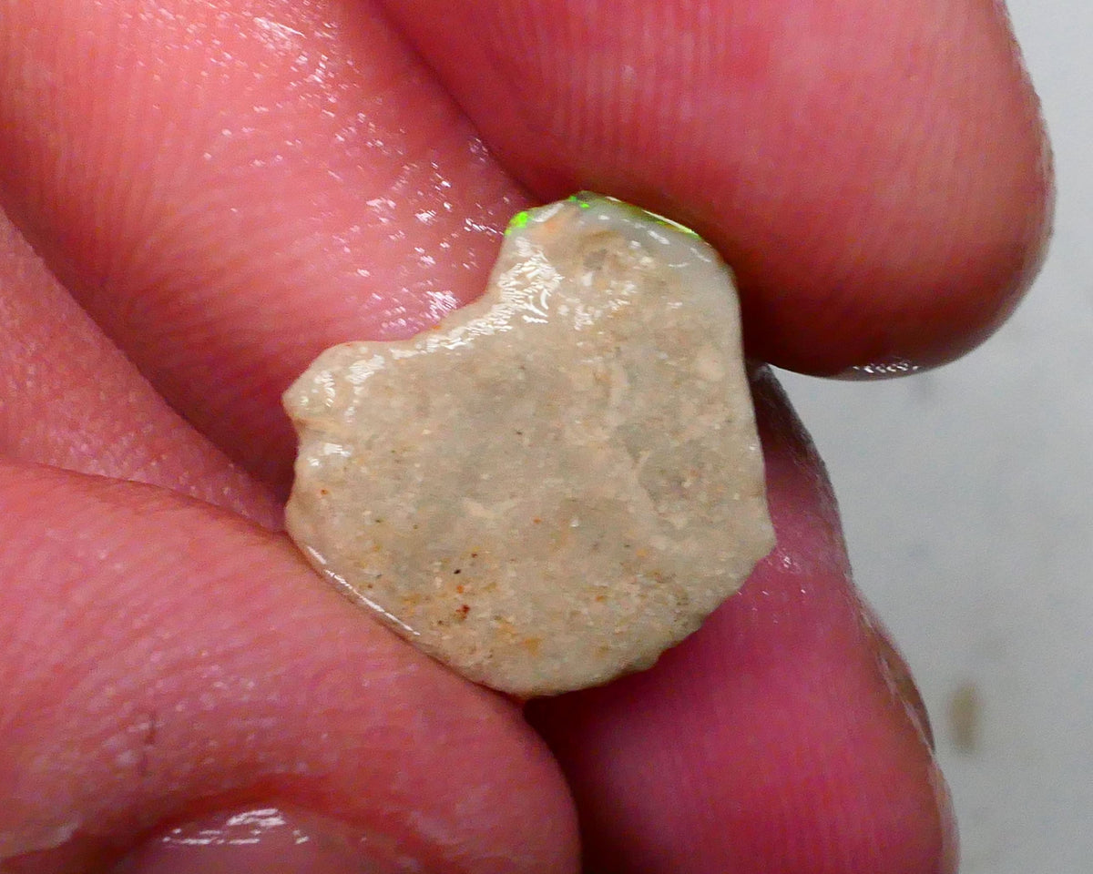 Oranges & Yellows dominant here 4.00cts Small Point to be had for those who dare Lightning Ridge 15x13x6mm Lot B4-A493