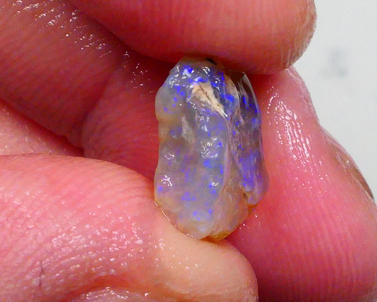 Dark Crystal knobby 4.10cts Thick Bar relative to its size loaded with confetti flashes of blues 13x11x4mm Lot B4-A491
