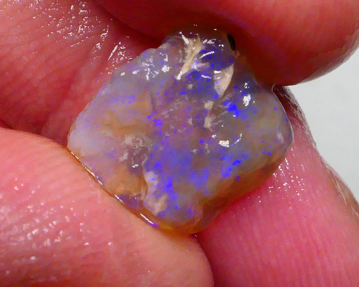 Dark Crystal knobby 4.10cts Thick Bar relative to its size loaded with confetti flashes of blues 13x11x4mm Lot B4-A491
